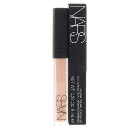 NARS concealer tucked inside a makeup bag for convenient everyday portability
