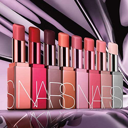 NARS tube next to coin showing full-size scale and portability benefit
