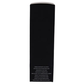 Lifestyle shot of NARS Pure Radiant Finland tucked in a travel bag for on-the-go glow