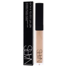 NARS concealer next to foundation showing how it seamlessly layers benefit