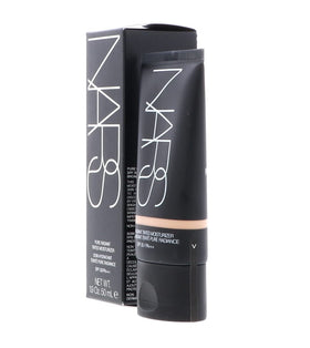 NARS tube side profile next to a coin for size comparison and portability