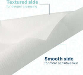 Nat.&Co. towel size shown in hand to illustrate extra-large surface and coverage