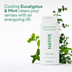 Native body wash on shower shelf with towel, suggesting refreshing daily routine