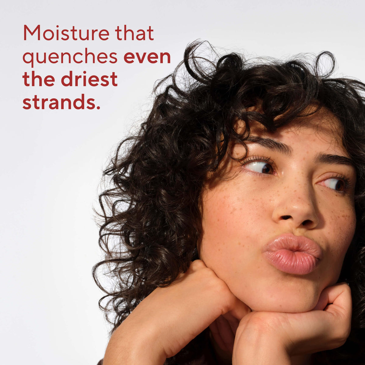 Close-up of conditioner texture pouring to show creamy hydration and detangling benefit
