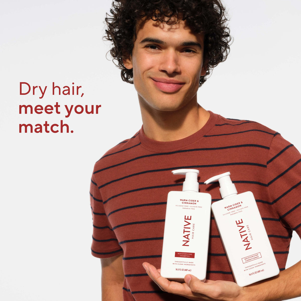Native conditioner on a shower shelf among toiletries showing daily routine compatibility benefit