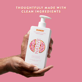 Native Strawberry Frosted creamy conditioner texture on hand showing slip and smoothness