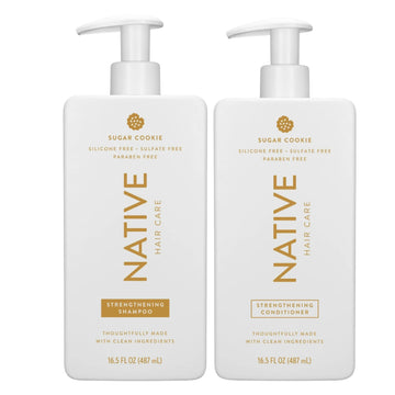 Native bottle front view showing Sugar Cookie conditioner and festive design benefit: clear product identity