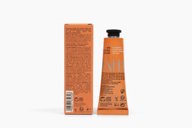 natura cream tucked in purse showing travel-ready convenience and self-care