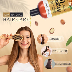 Applying Natural Riches argan oil to hair ends to reduce frizz and add shine