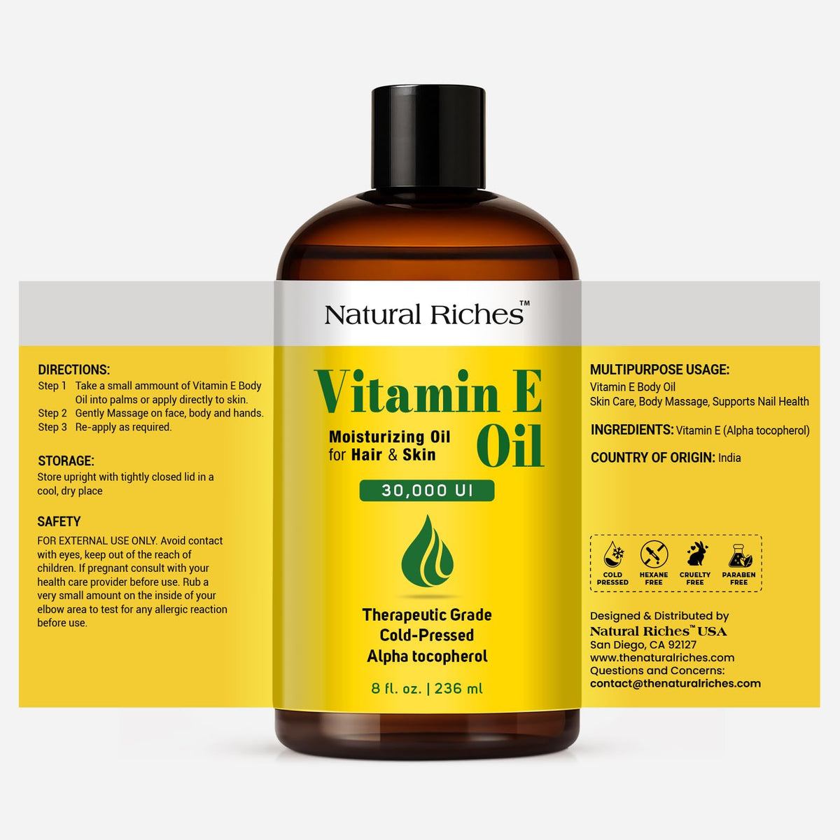 Natural Riches dispensing Vitamin E oil from dropper highlighting controlled application