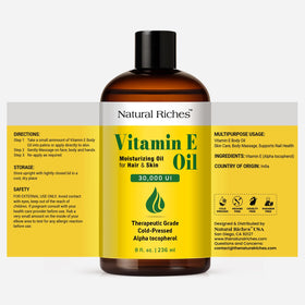 Natural Riches dispensing Vitamin E oil from dropper highlighting controlled application