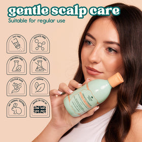 Nature Spell shampoo being applied to wet hair showing smoother, detangled strands