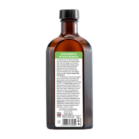 Nature Spell oil on bathroom shelf styled in a routine setting for lifestyle context