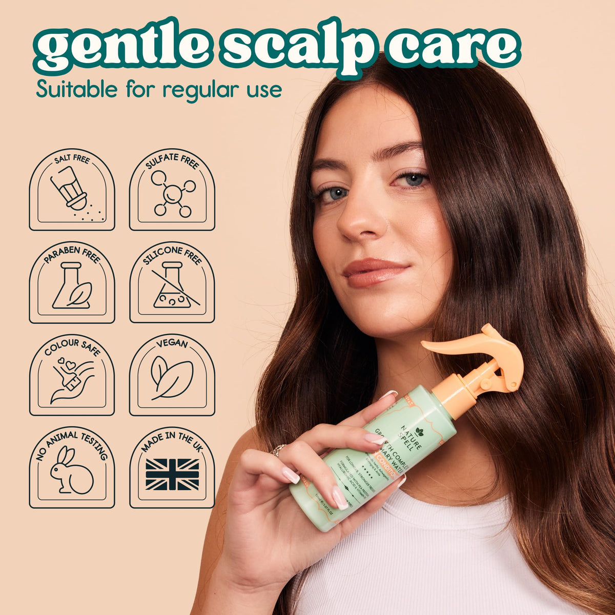 Nature Spell spraying on damp hair for detangling and heat protection
