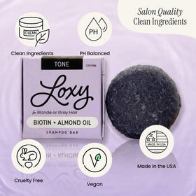 NATURÉL Loxy ingredients shot with almond oil and biotin highlighting nourishment