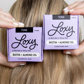 NATURÉL Loxy ingredients label with biotin and almond oil benefits