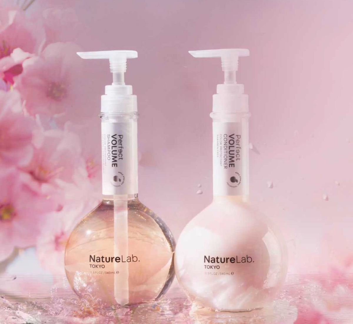 NatureLab.TOKYO bottle next to hand showing true 11.5 fl oz scale
