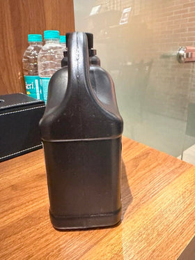 Naturevibe Botanicals bottle next to ruler showing 32 oz scale