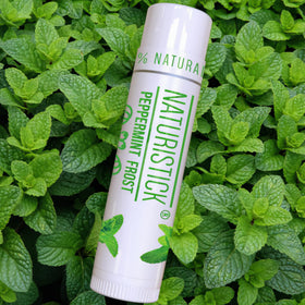 Naturistick seven tubes arranged in purse and travel kit for on-the-go use