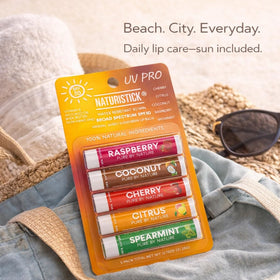 Naturistick UV Pro lifestyle outdoor use on a beach demonstrating everyday sun protection benefit