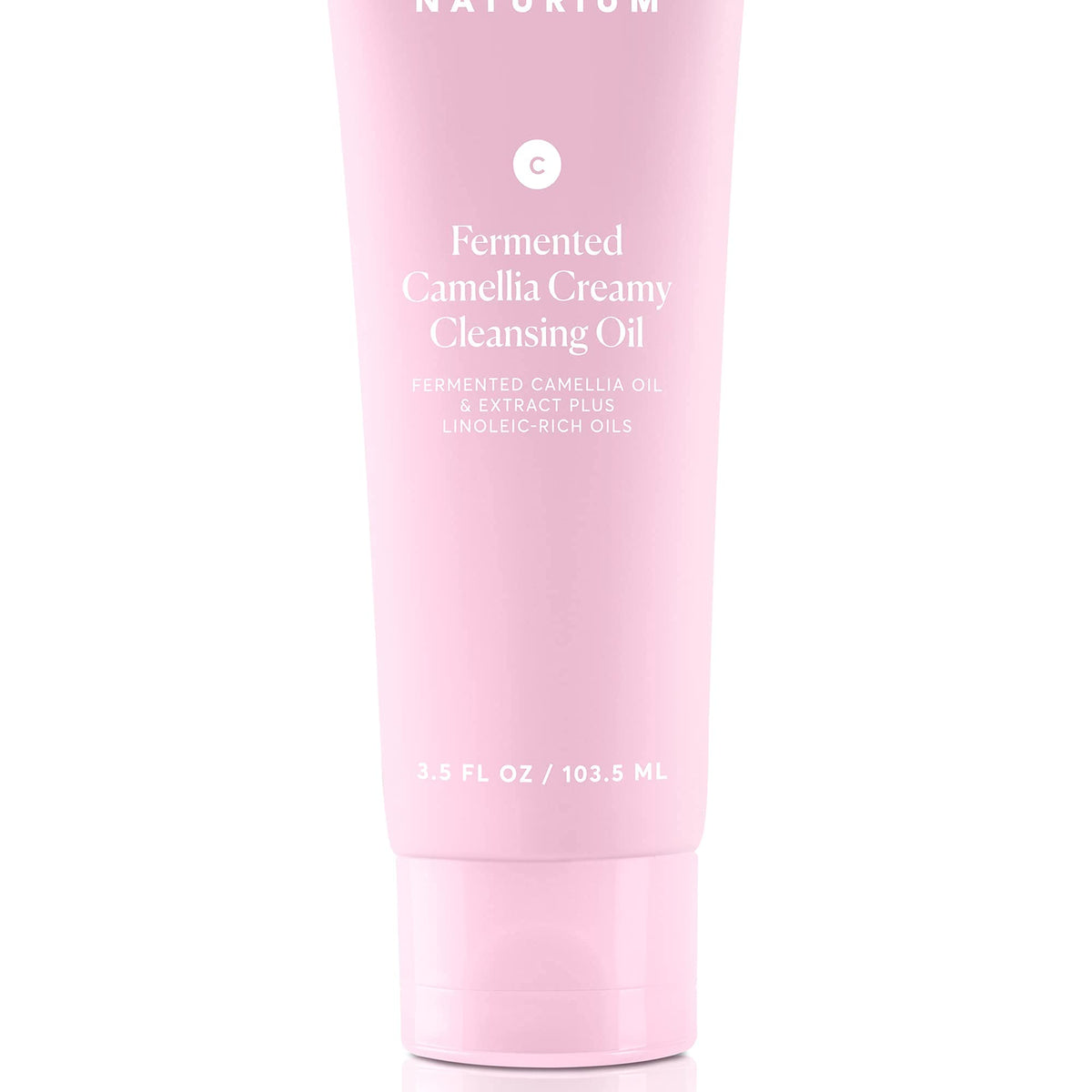 Naturium Cleansing Oil on bathroom shelf in lifestyle scene for travel and routine benefit