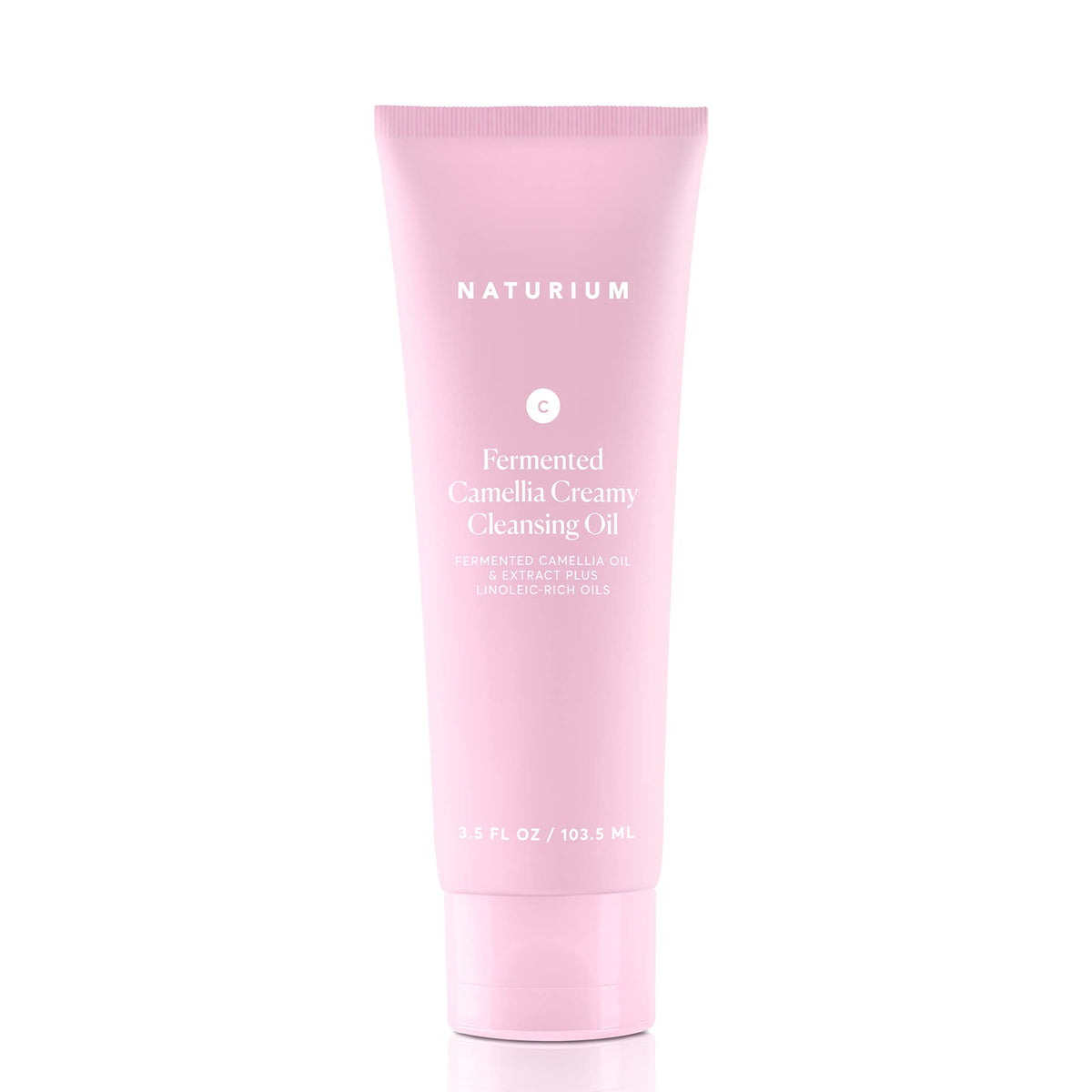 Naturium dispensing pump releasing the gel, illustrating controlled application benefit