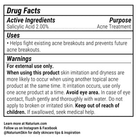Naturium bottle on bathroom shelf in routine setting showing approachable skincare