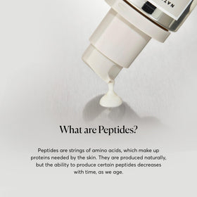 Naturium serum on bathroom vanity in lifestyle scene for daily routine