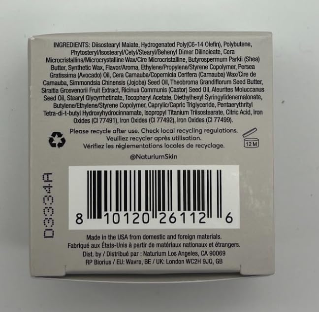 Naturium lip mask beside bedtime items to show overnight use benefit