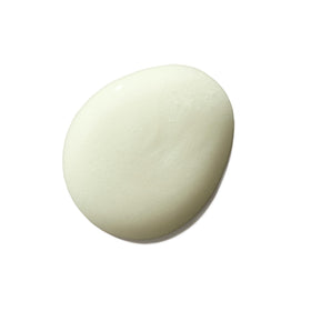Close-up whipped texture of Naturium wash highlighting creamy, non-drying formulation