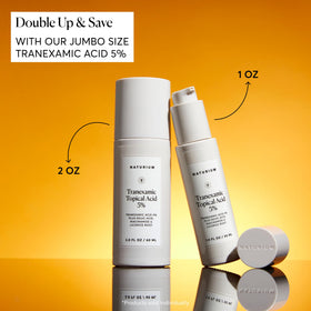 Naturium bottle held in hand illustrating 2 oz jumbo size advantage