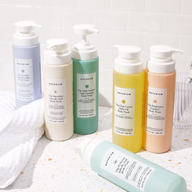 Naturium in-shower use with lather showing gentle cleansing benefit