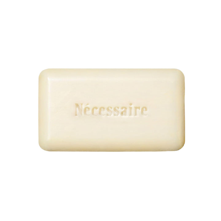 Nécessaire front packaging of the exfoliant bar highlighting fragrance-free benefit