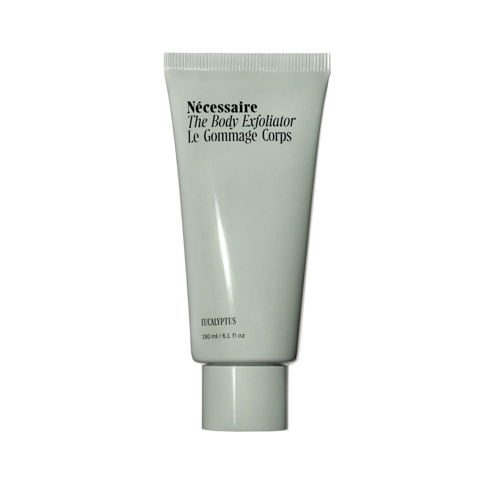 Nécessaire bottle front view showing clean design and recyclable packaging benefit