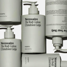 Nécessaire pump dispensing lotion demonstrating easy one-hand use and controlled dosing