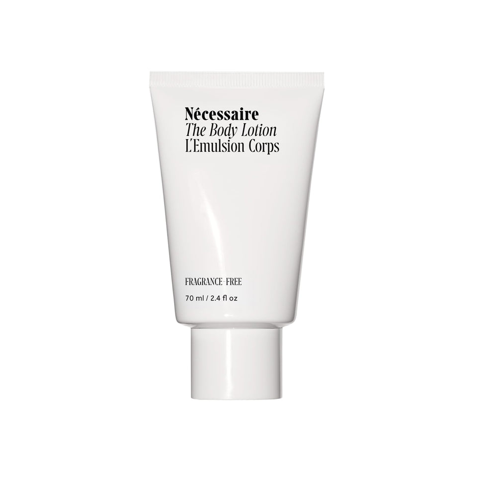 Nécessaire front bottle showing sleek label and daily moisture benefit