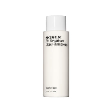 Nécessaire conditioner front packaging showing clean bottle and product clarity