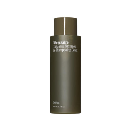 Nécessaire front bottle view showing minimalist detox shampoo packaging and shelf appeal