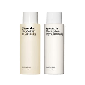 Nécessaire hair duo front packaging showing both bottles and benefits