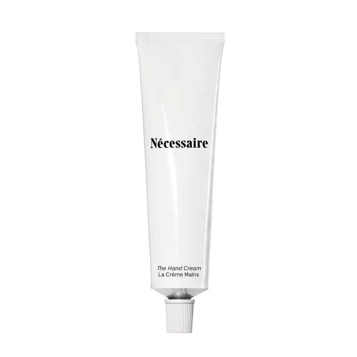 Nécessaire front tube view showing clean packaging and easy dispensing benefit