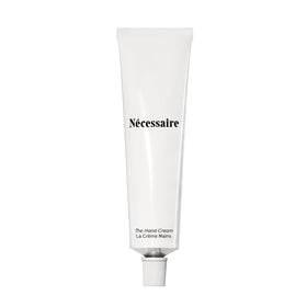Nécessaire front tube view showing clean packaging and easy dispensing benefit