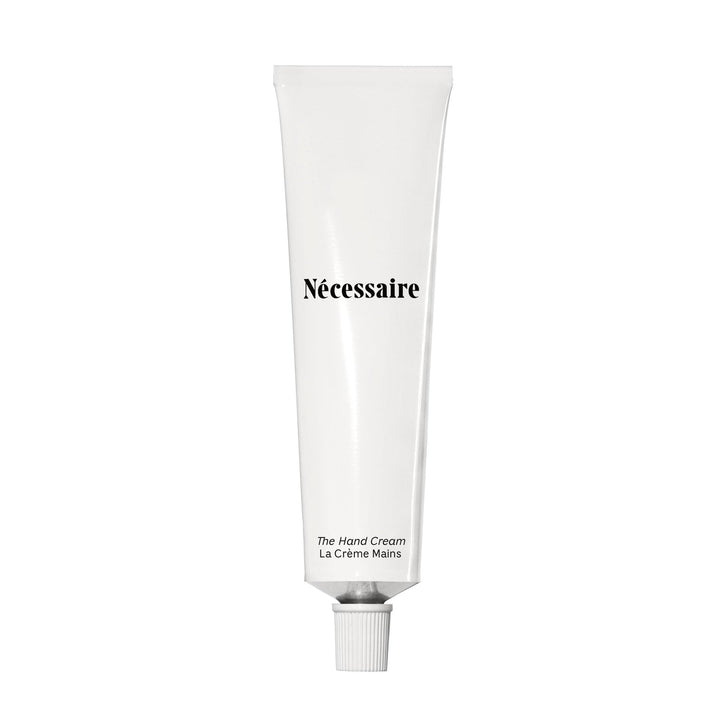 Nécessaire front tube view showing clean packaging and easy dispensing benefit
