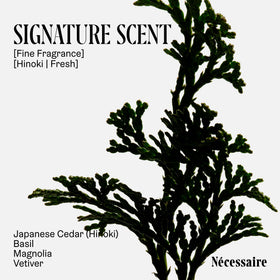 Nécessaire bottle in hand demonstrating 15.2oz scale and convenience