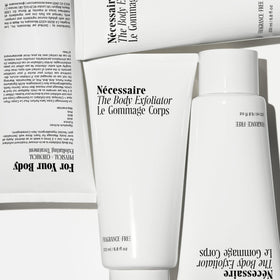 Nécessaire applied in shower demonstrating gentle use and smoother skin benefits