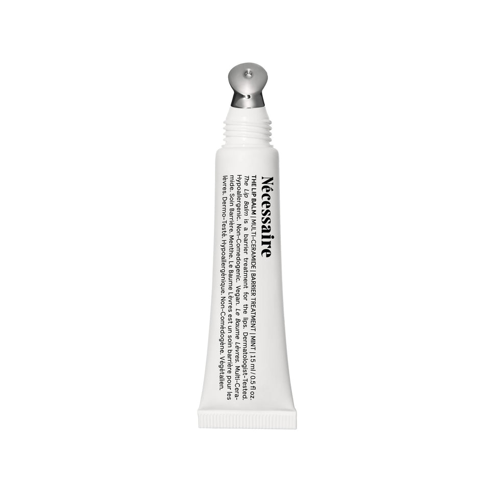 Nécessaire front tube view showing clean packaging and travel-friendly size benefit