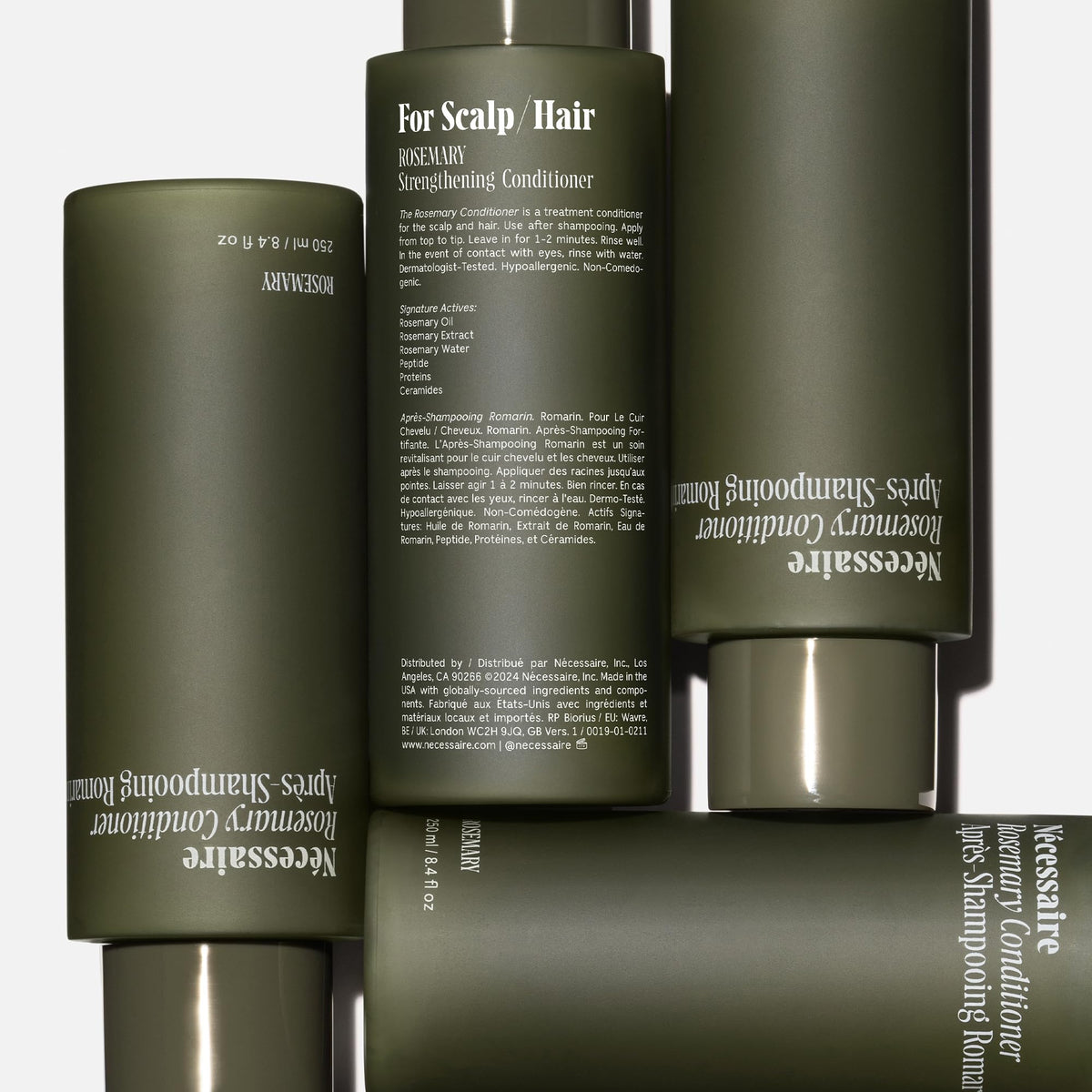Nécessaire cream texture on palm showing lightweight gel-cream for easy detangling