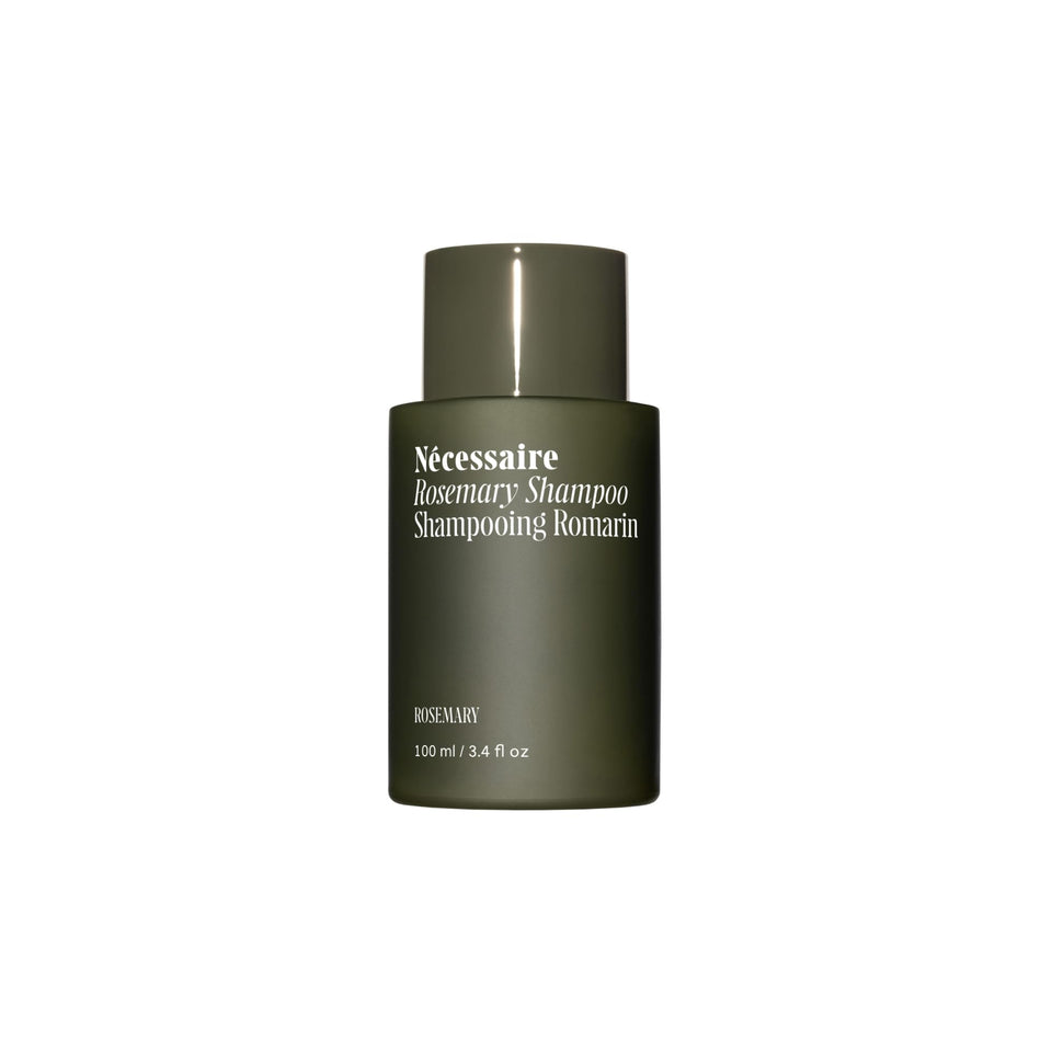 Nécessaire bottle front packaging showing rosemary shampoo for gentle strengthening