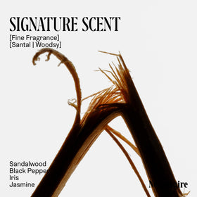 Nécessaire scent notes card with sandalwood suggesting a warm fragrance benefit