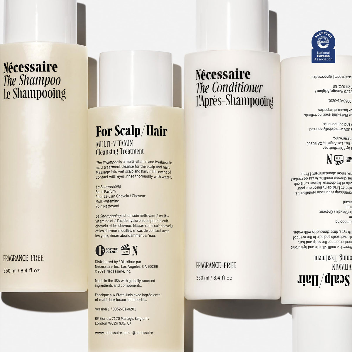Nécessaire shampoo bottle label close-up highlighting ingredients and seal