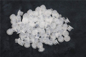 Needlehouse front packaging showing 1000 clear ink caps and bulk value
